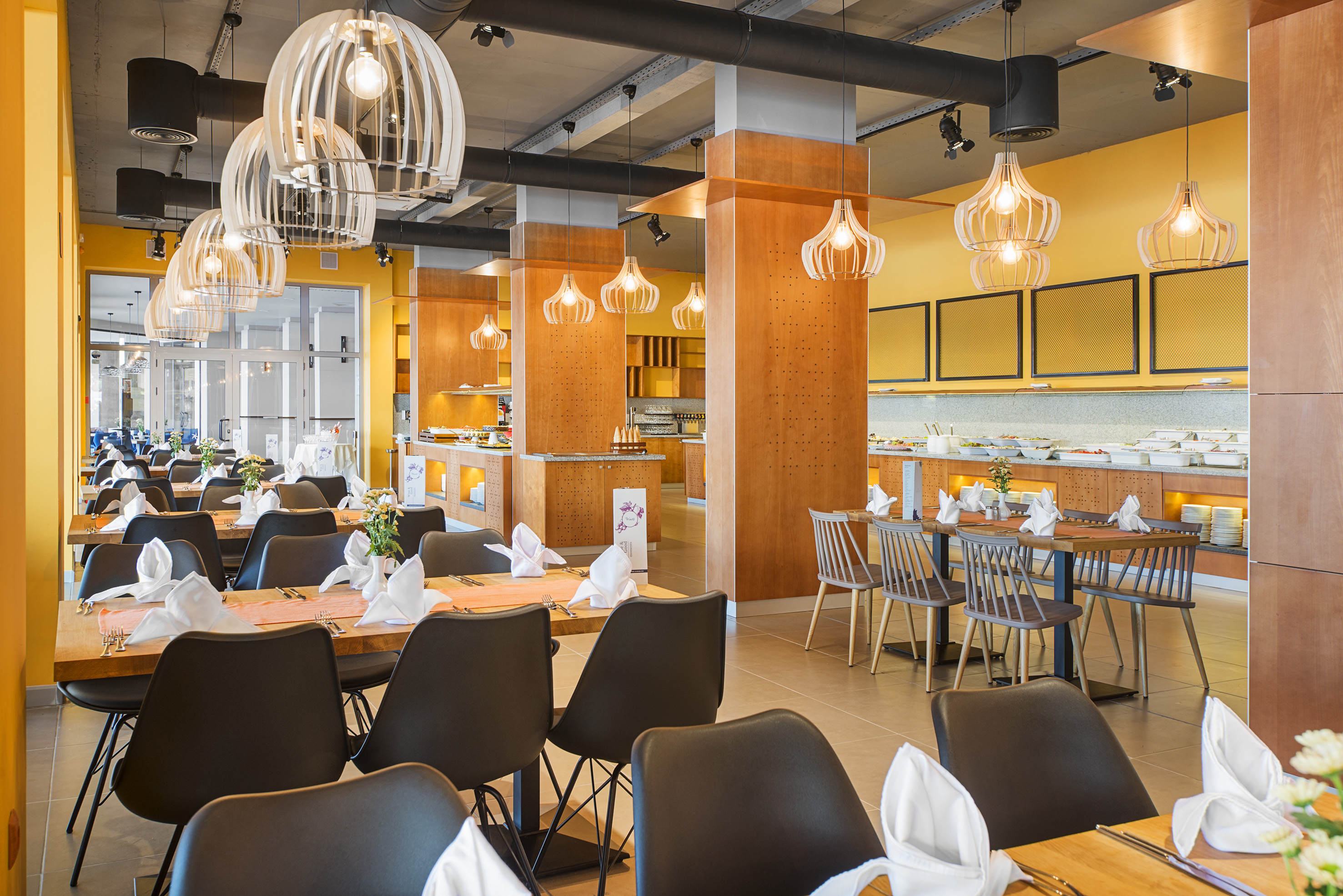 a restaurant with tables and chairs
