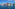 a group of colorful houses on water