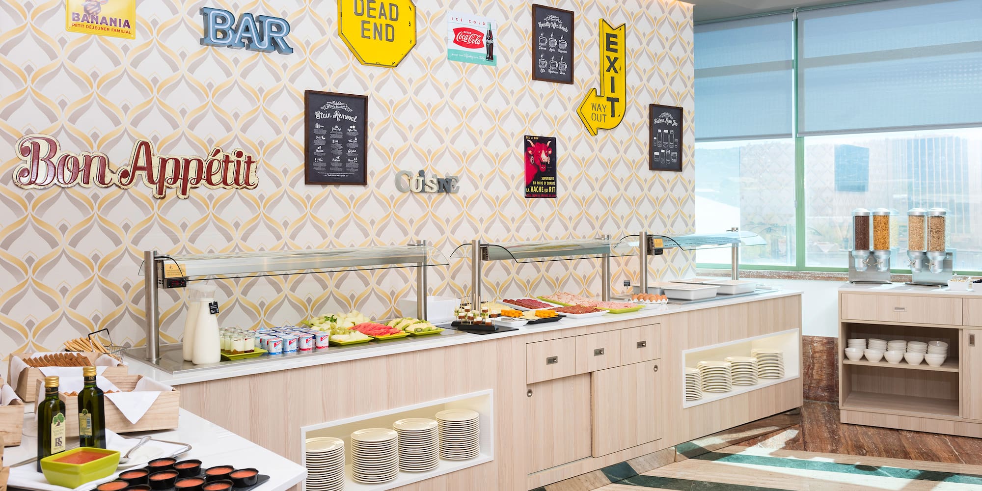 a buffet line with food on the counter