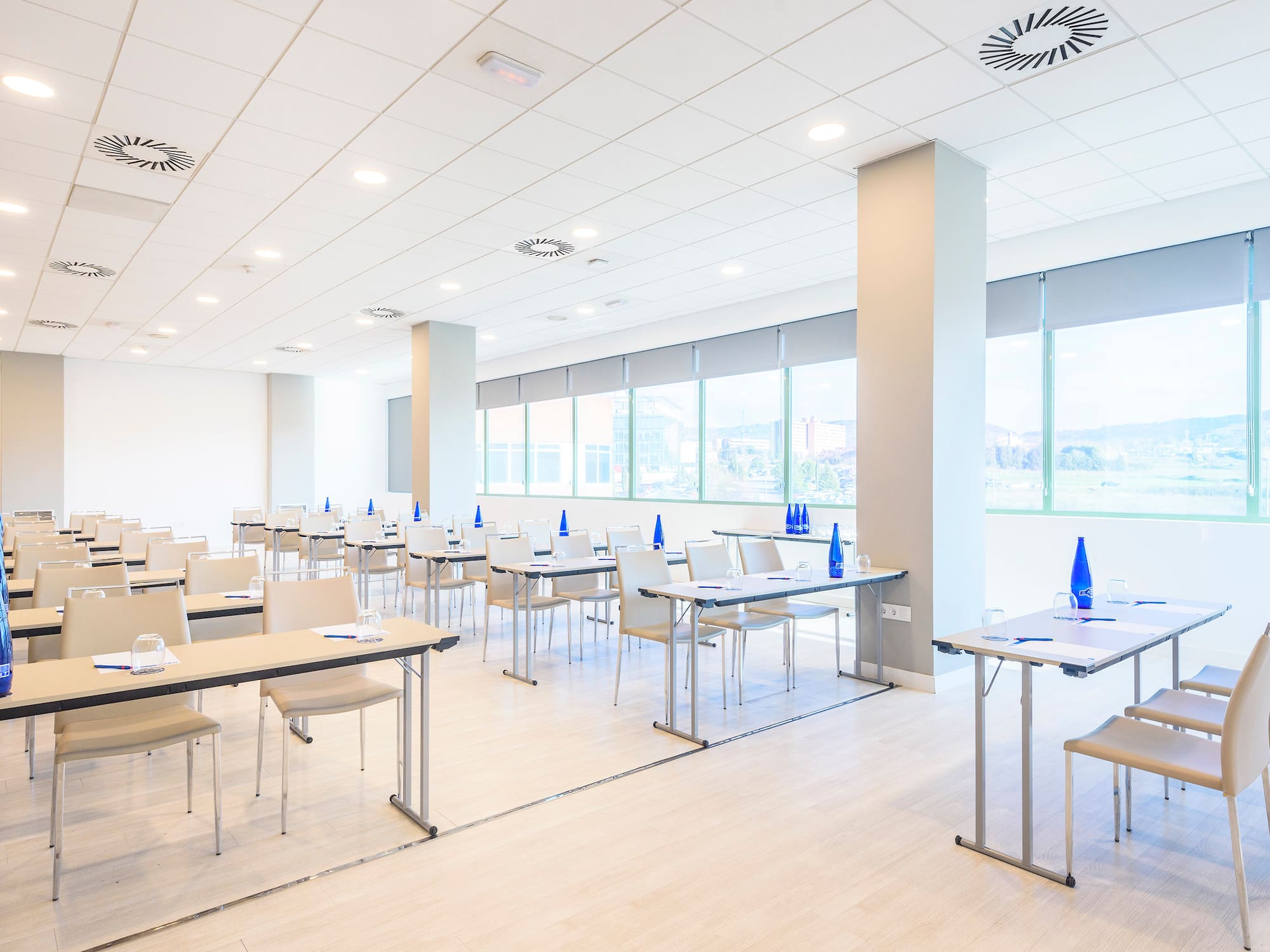 a room with tables and chairs