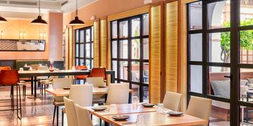 a room with tables and chairs