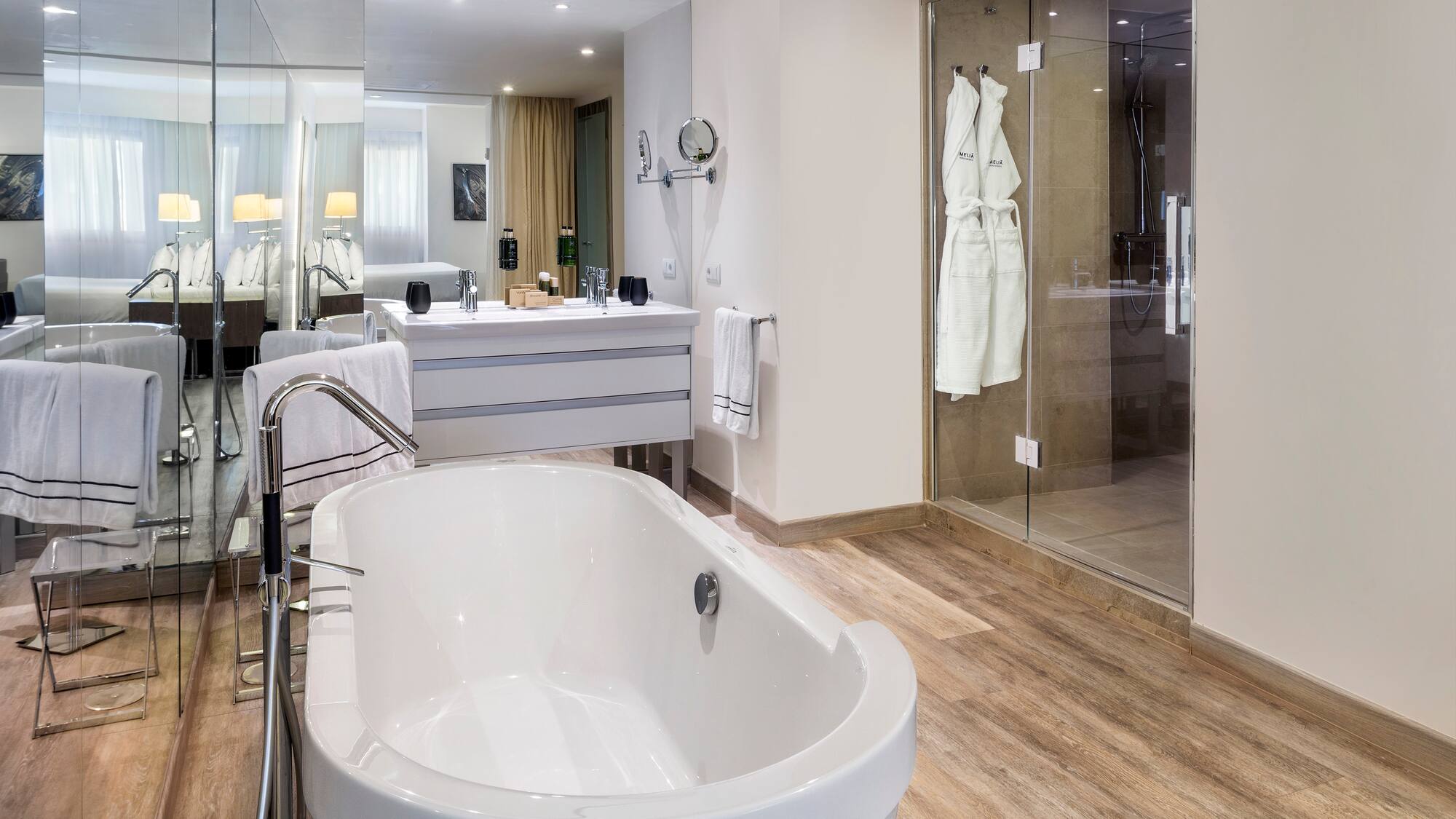 a bathroom with a tub and sink