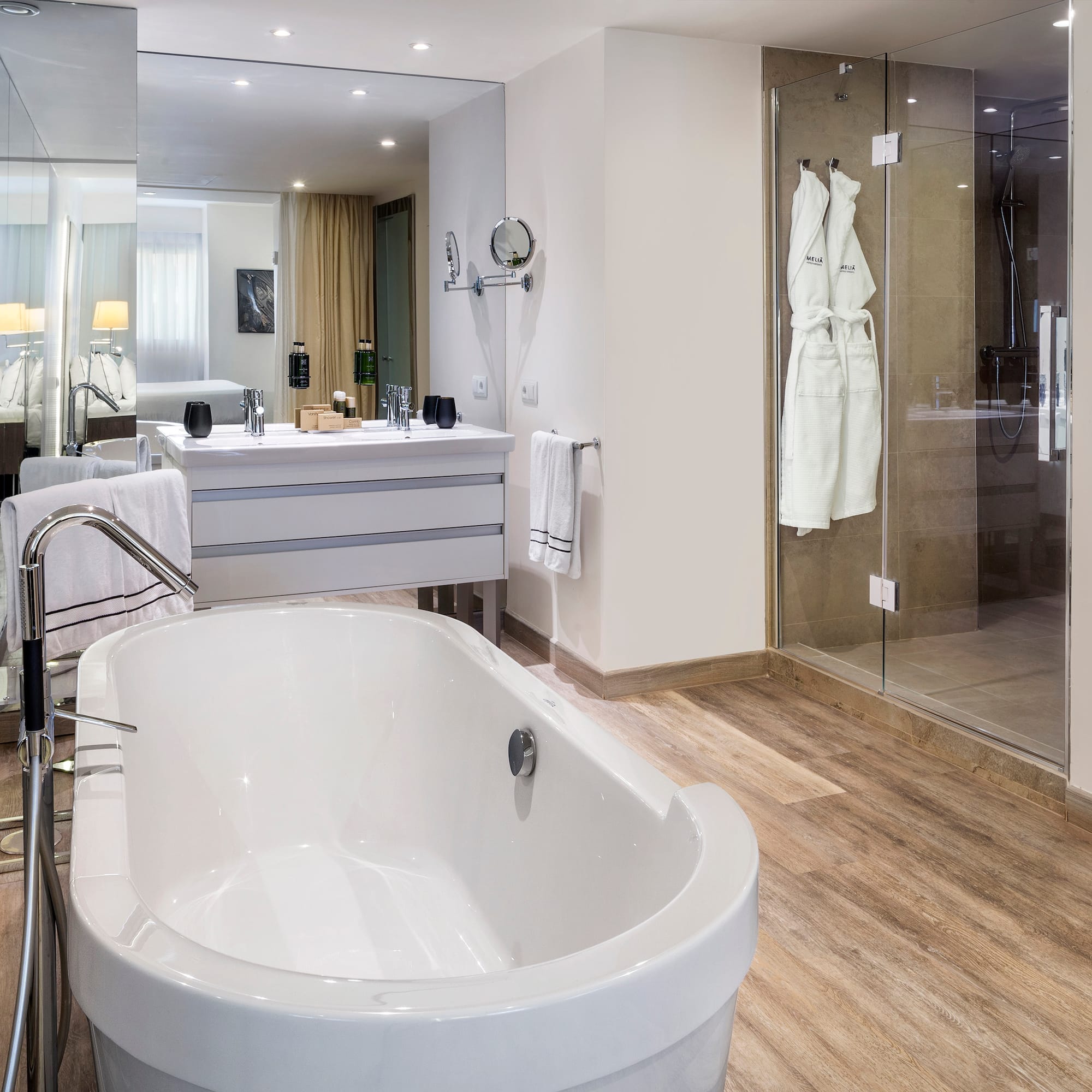 a bathroom with a tub and sink