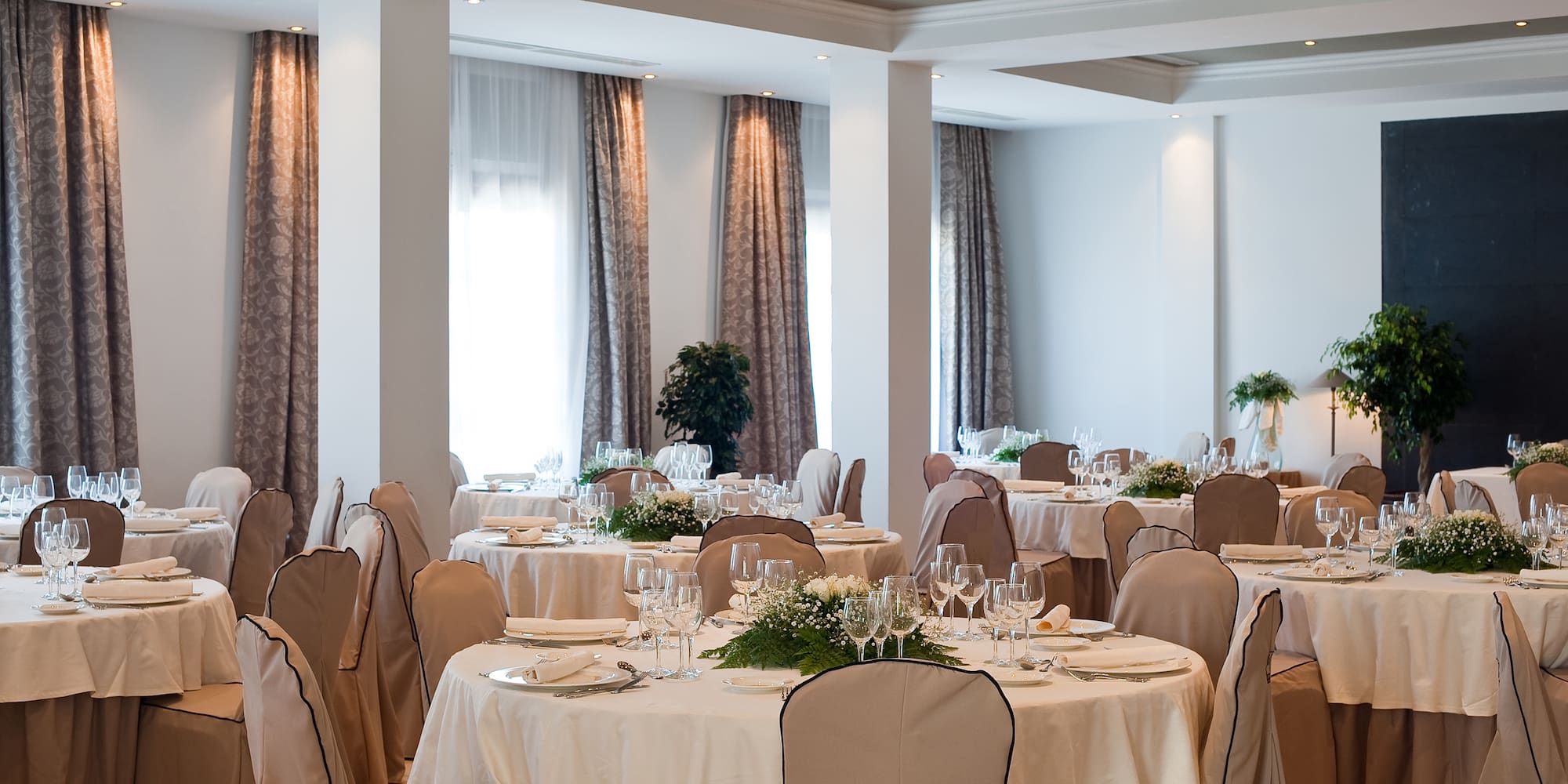 a room with tables and chairs