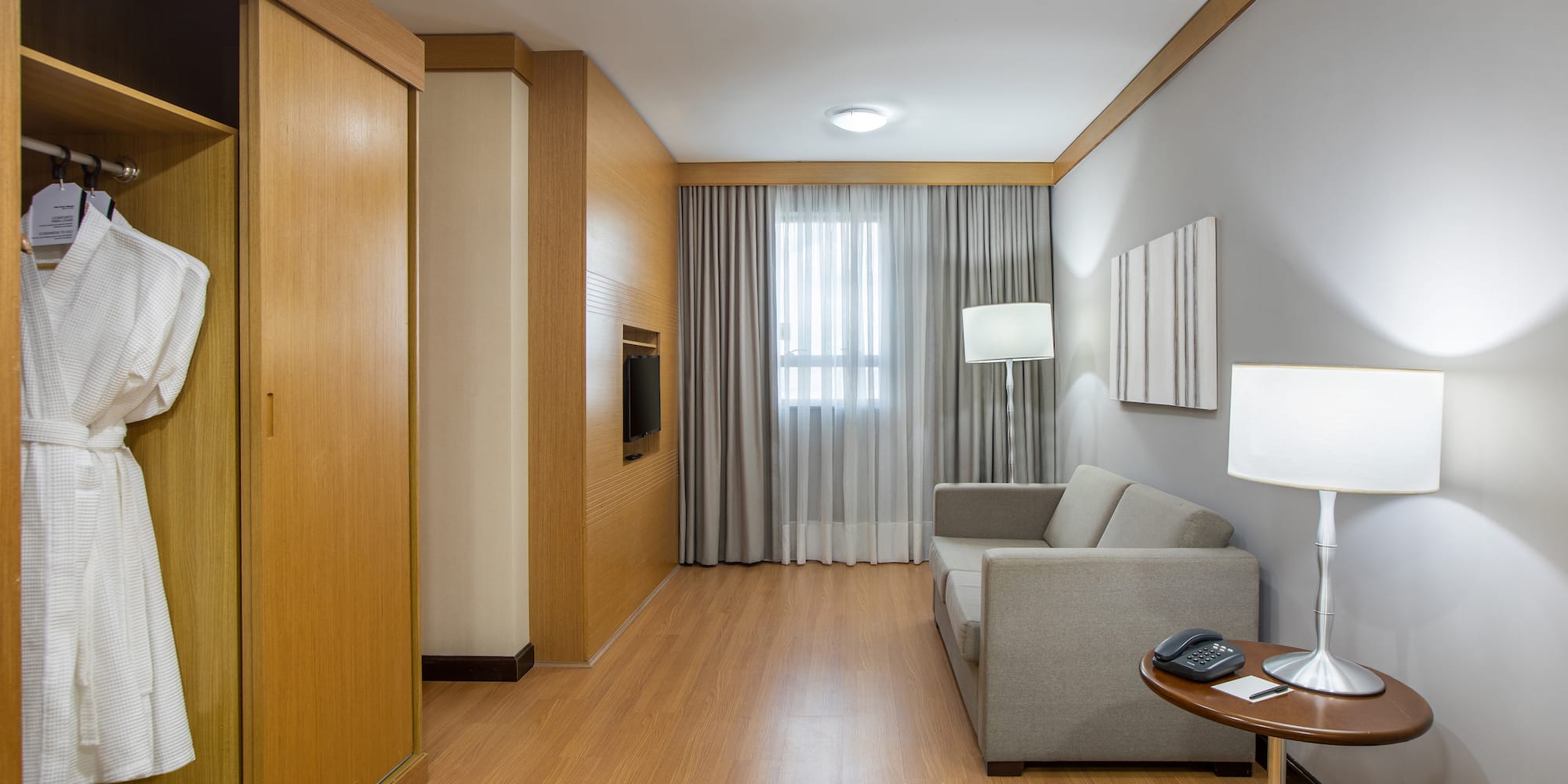 a room with a couch and a tv