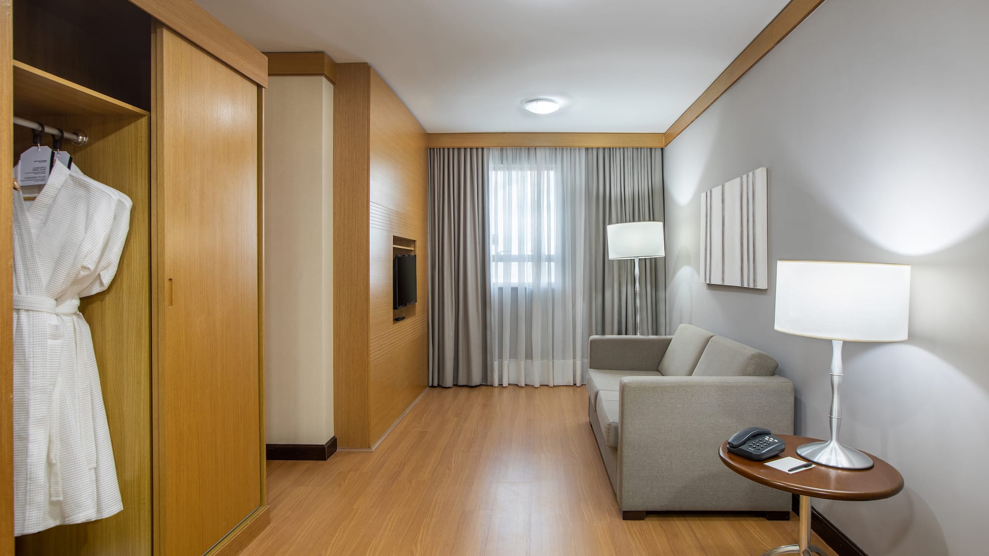 a room with a couch and a tv