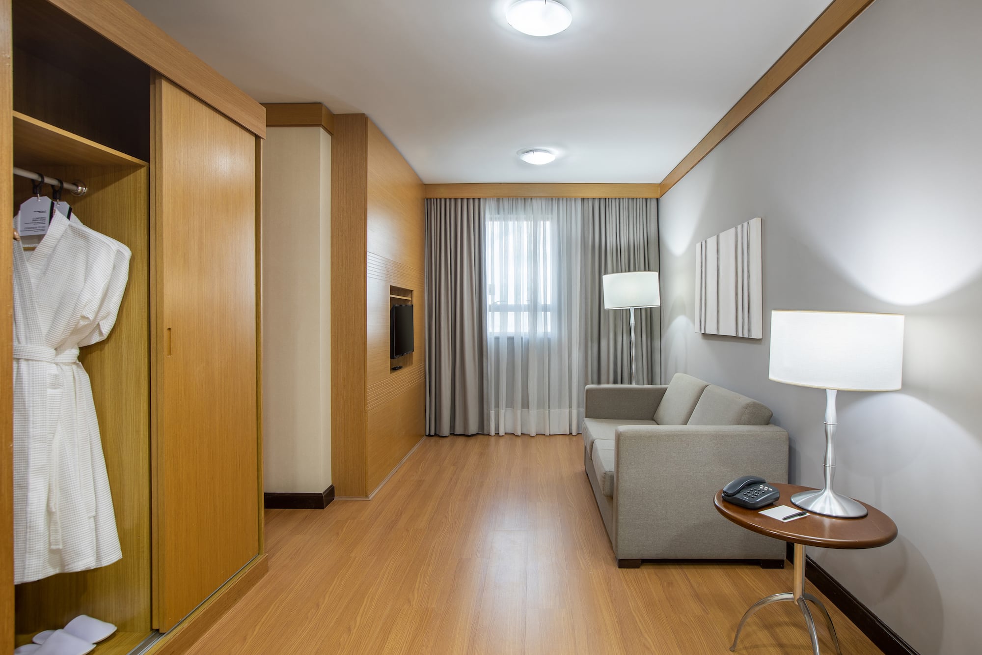 a room with a couch and a tv