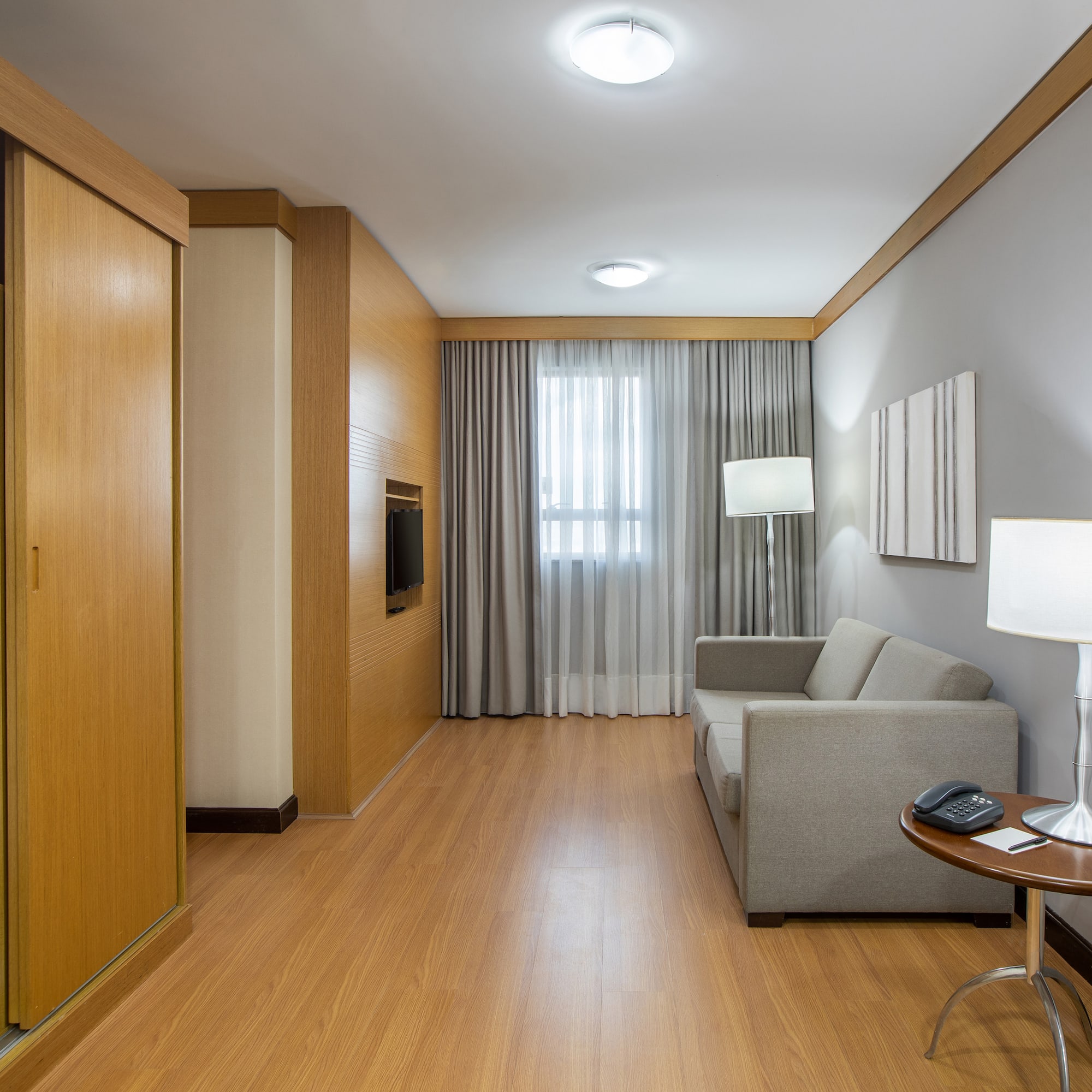 a room with a couch and a tv