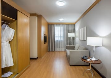 a room with a couch and a tv