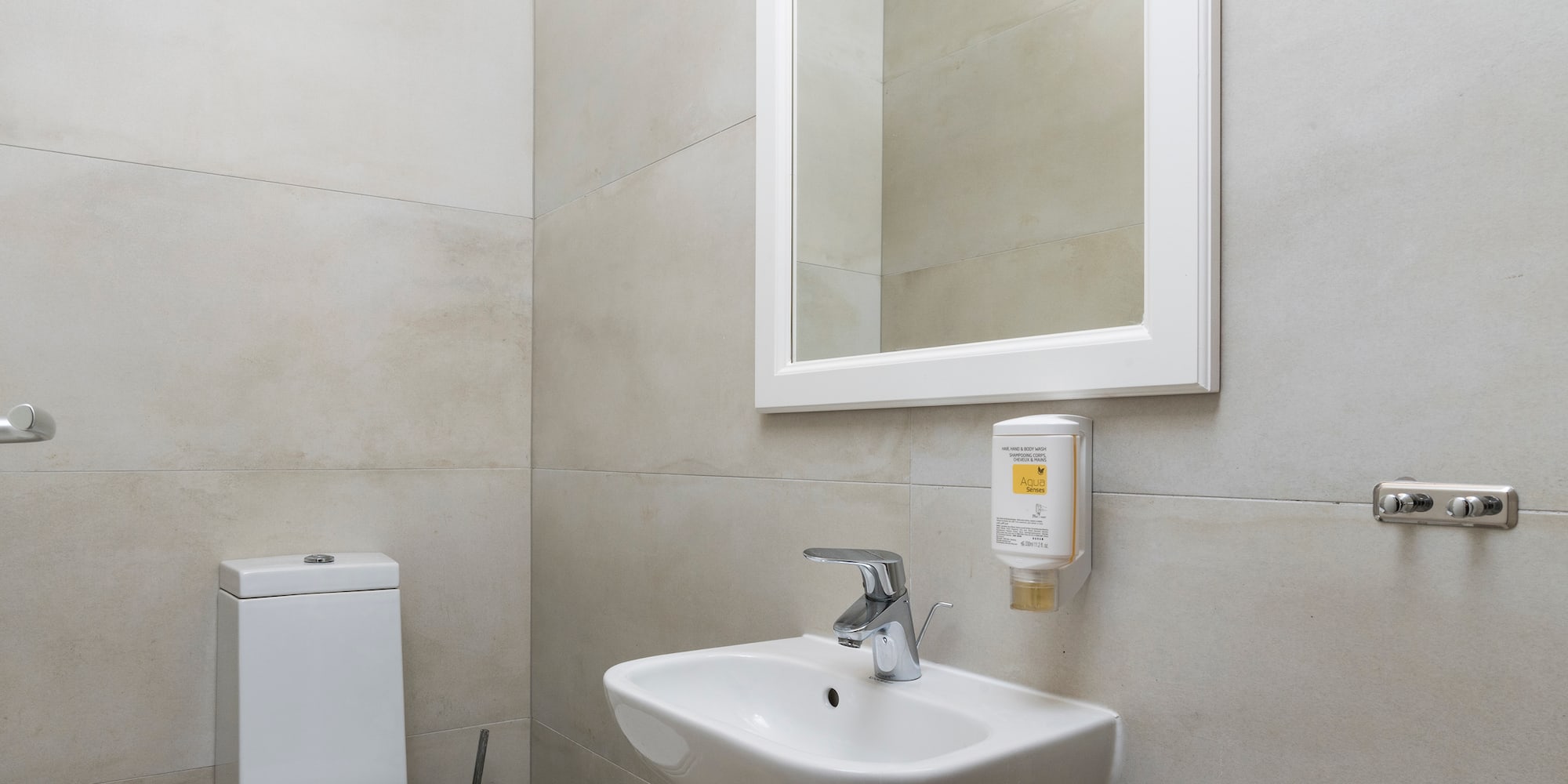 a bathroom with a sink and toilet
