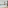 Bright hotel room with twin beds, white linens, teal pillows, AC, and window view.
