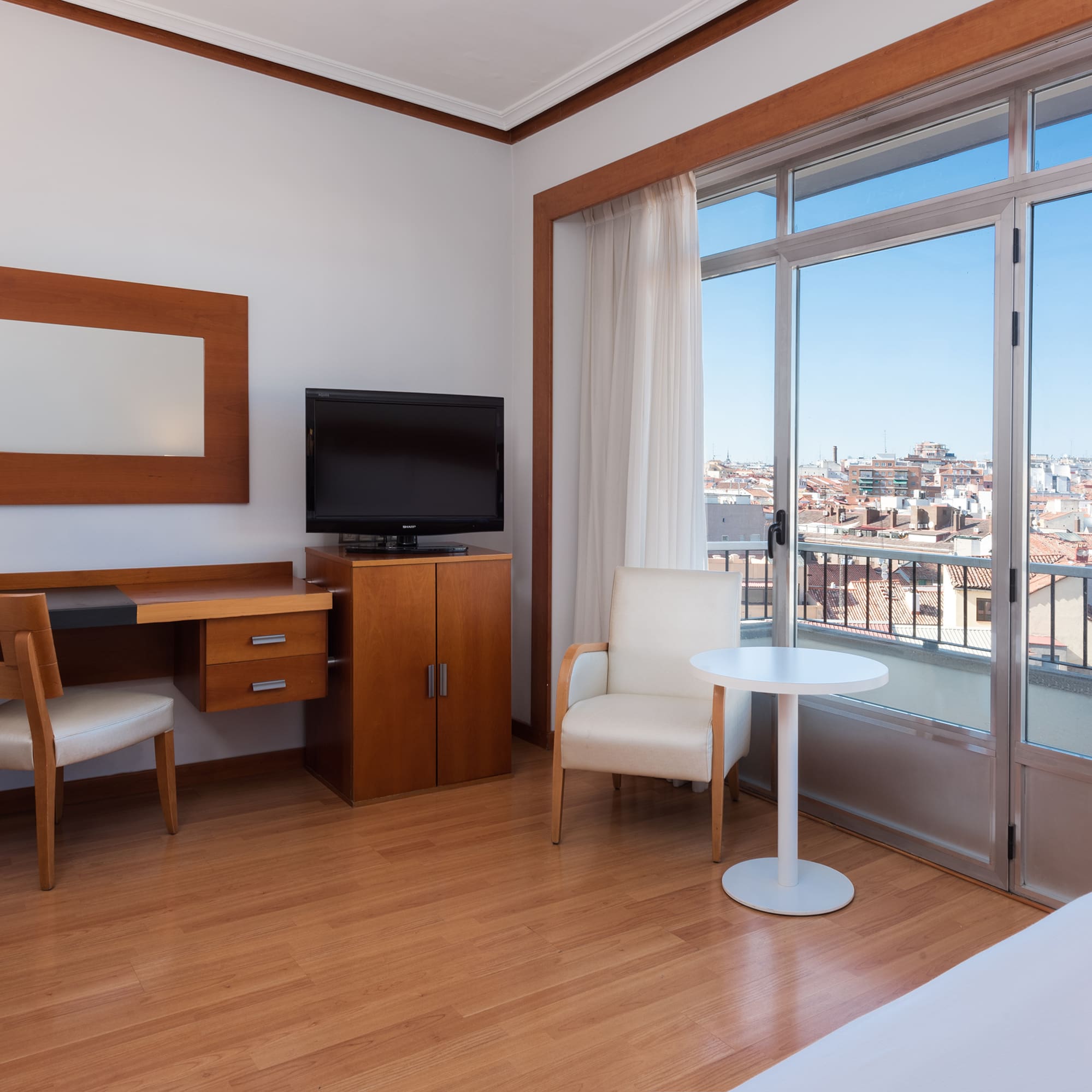 a room with a television and a table