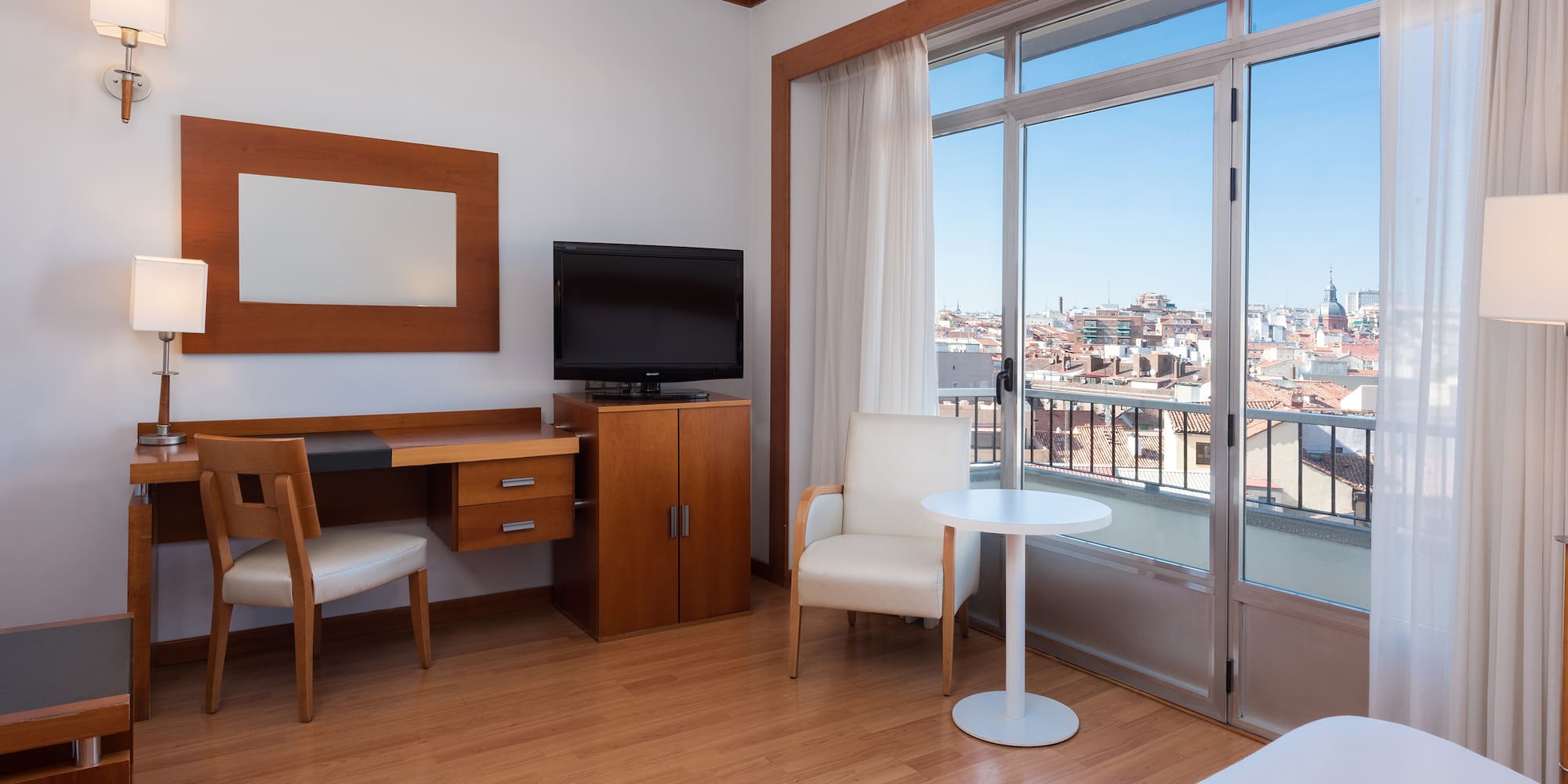 a room with a television and a table