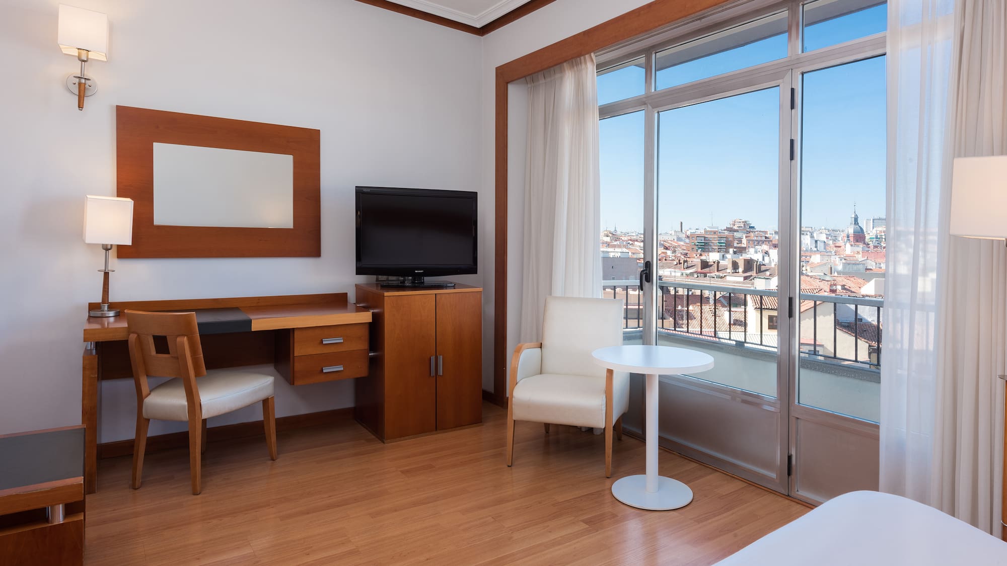 a room with a television and a table