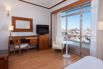 a room with a television and a table