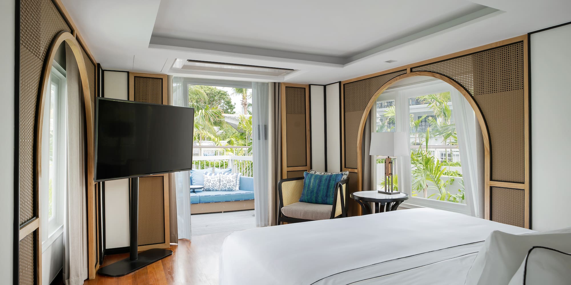 a room with a television and a bed