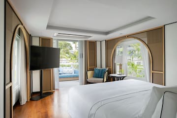 a room with a television and a bed