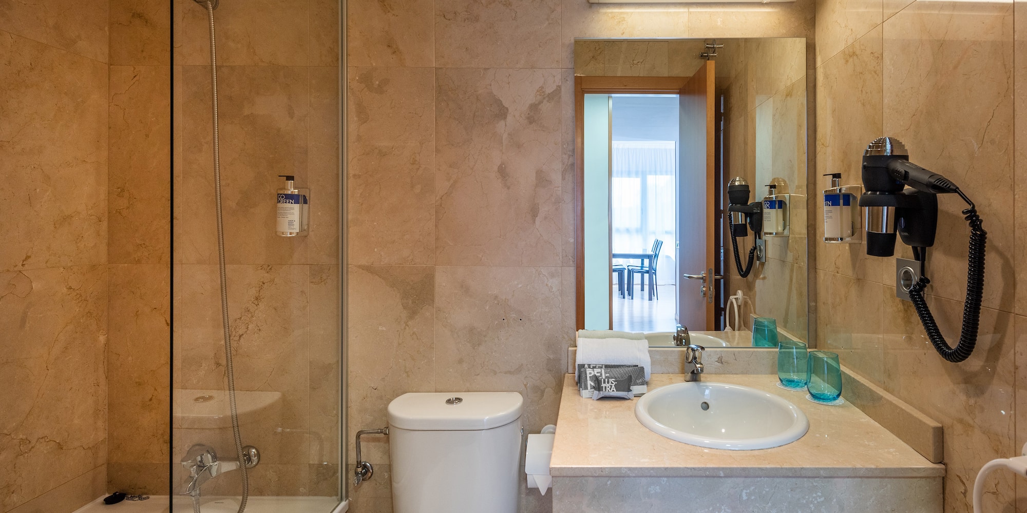 a bathroom with a shower and sink