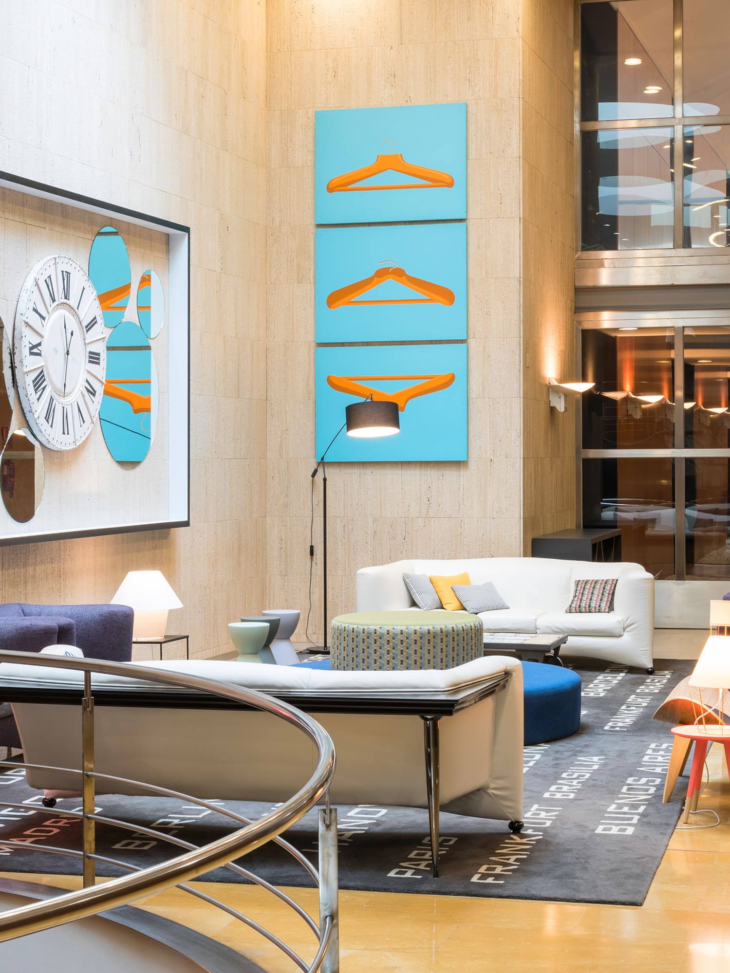 a room with a clock and a wall of furniture