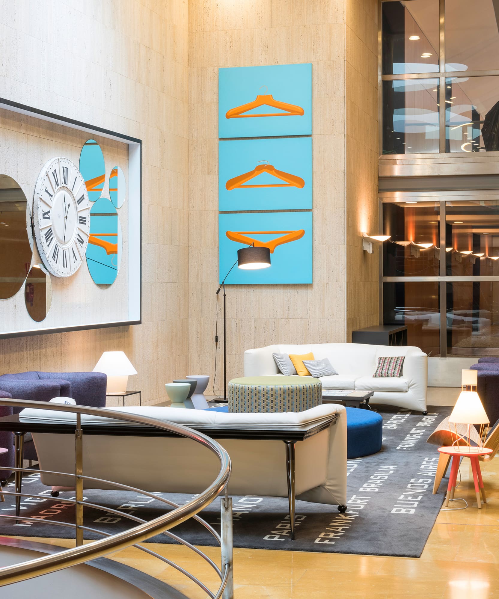 a room with a clock and a wall of furniture