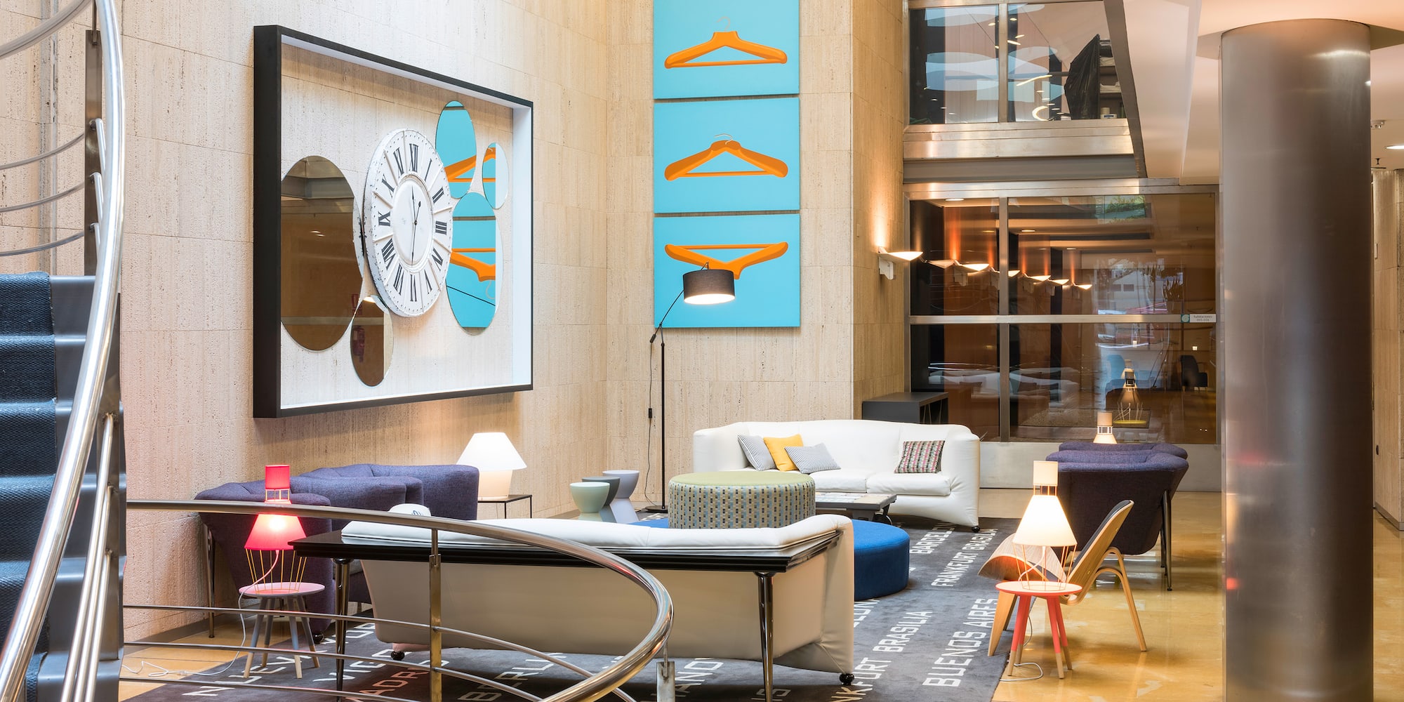 a room with a clock and a wall of furniture