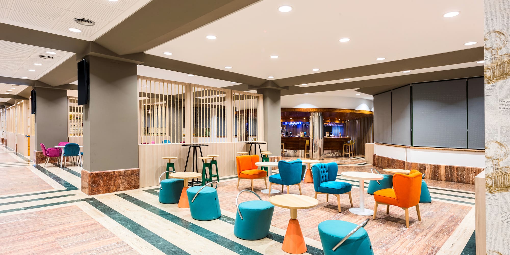 a room with tables and chairs