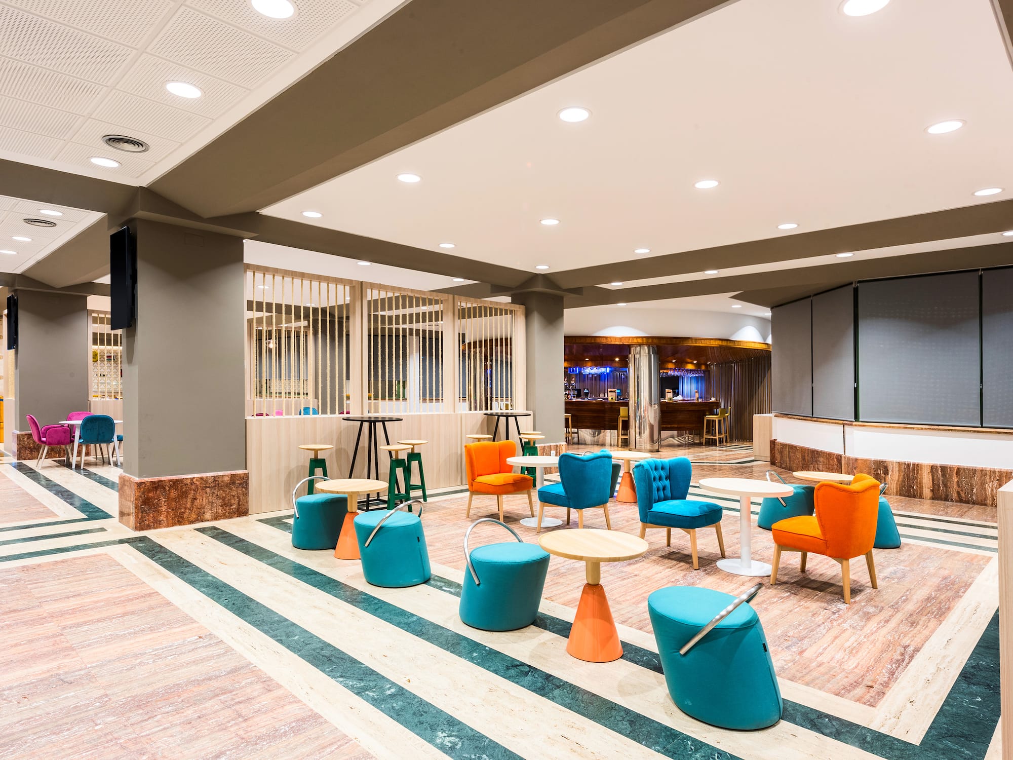 a room with tables and chairs