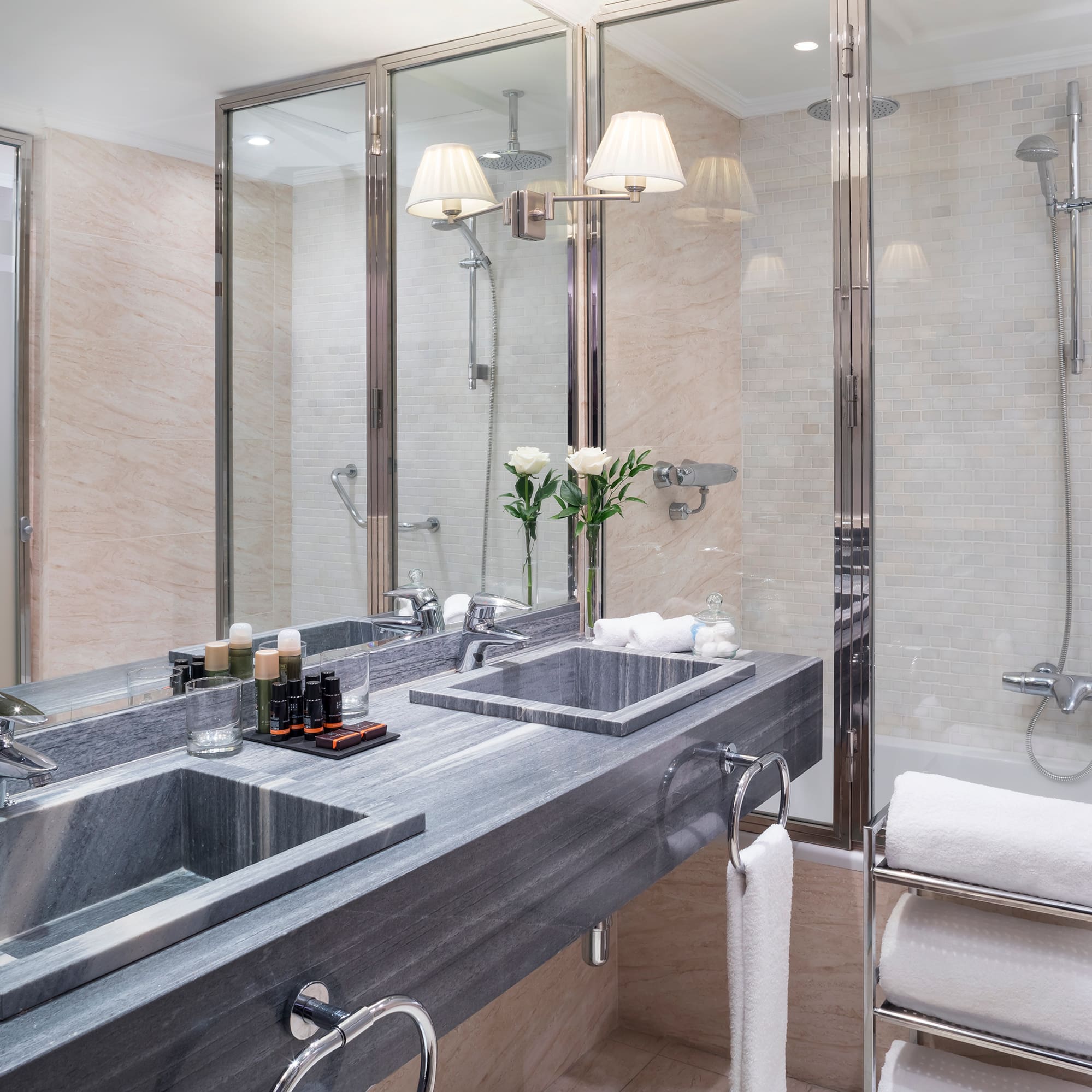 a bathroom with a shower and sink