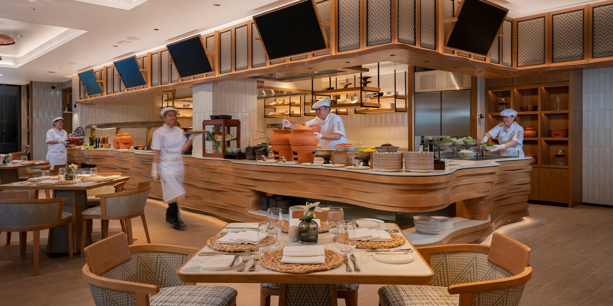 a group of chefs working in a restaurant