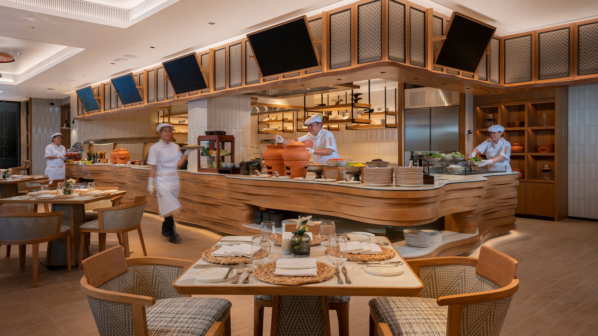 a group of chefs working in a restaurant
