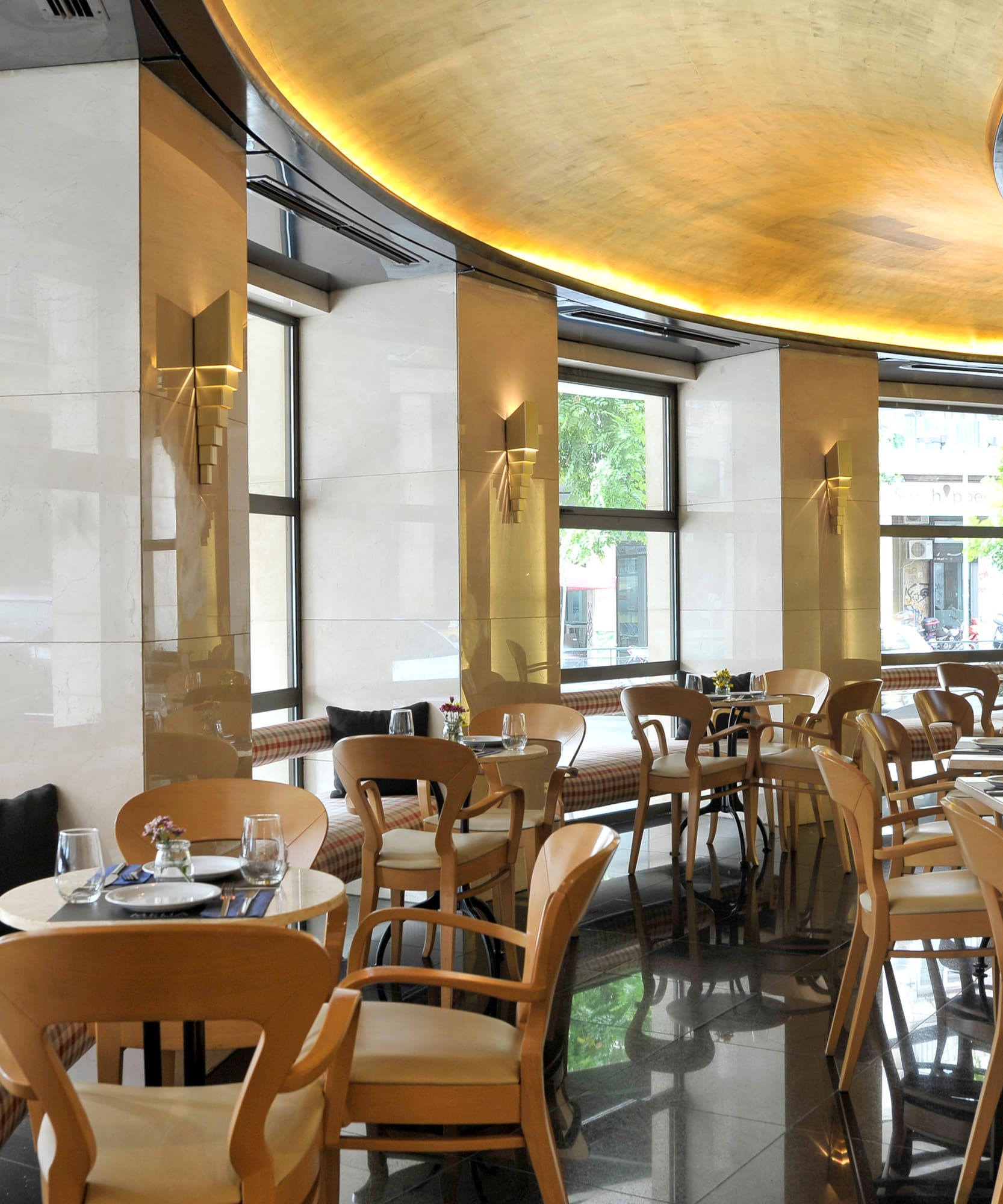 a restaurant with tables and chairs