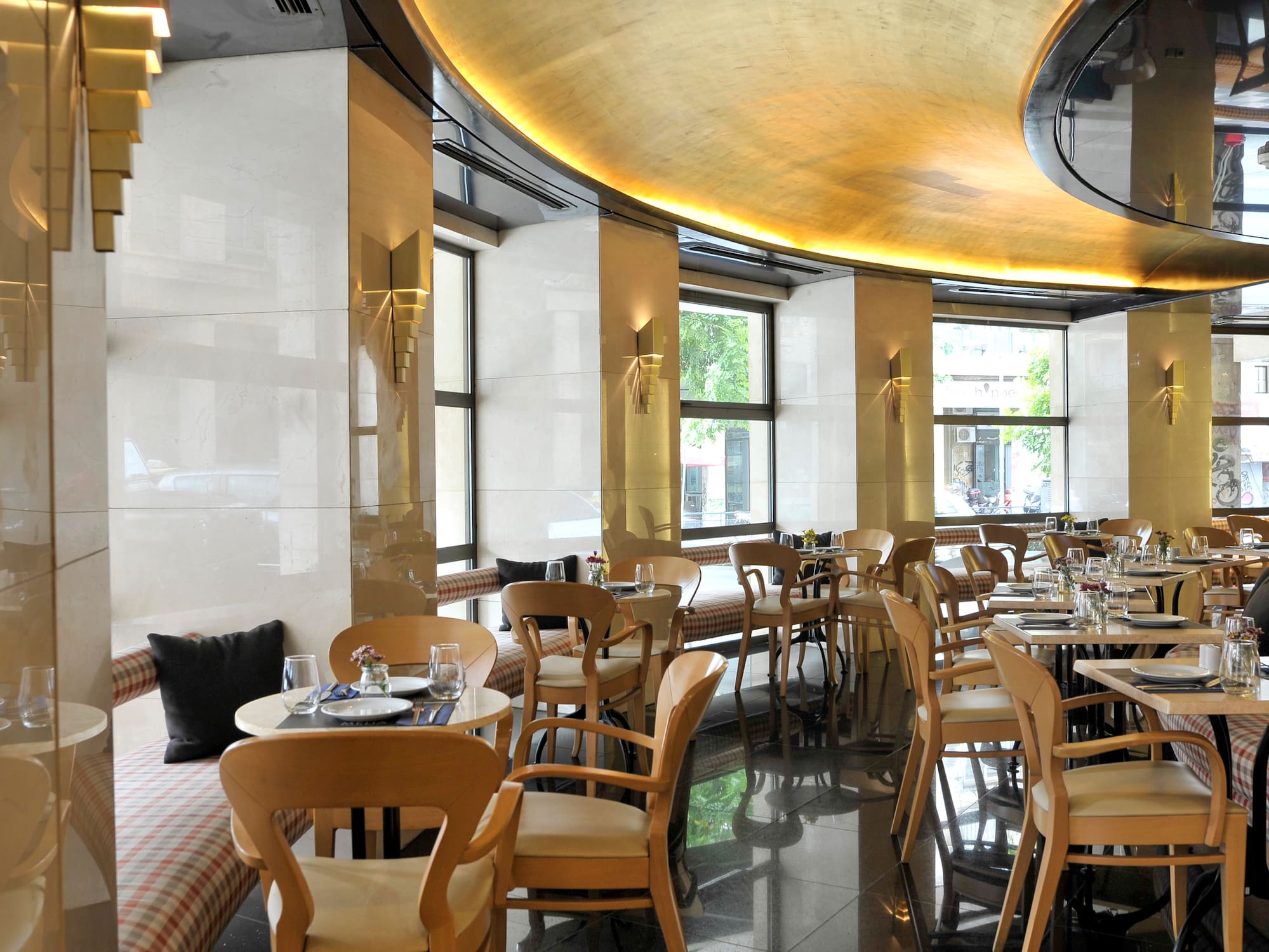 a restaurant with tables and chairs