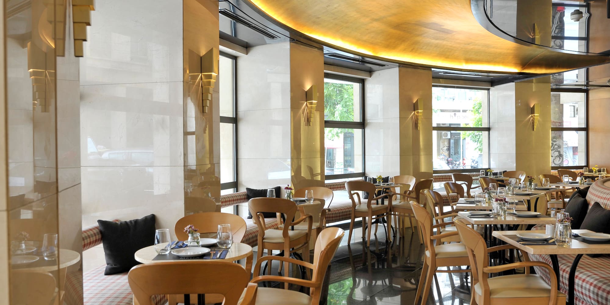 a restaurant with tables and chairs