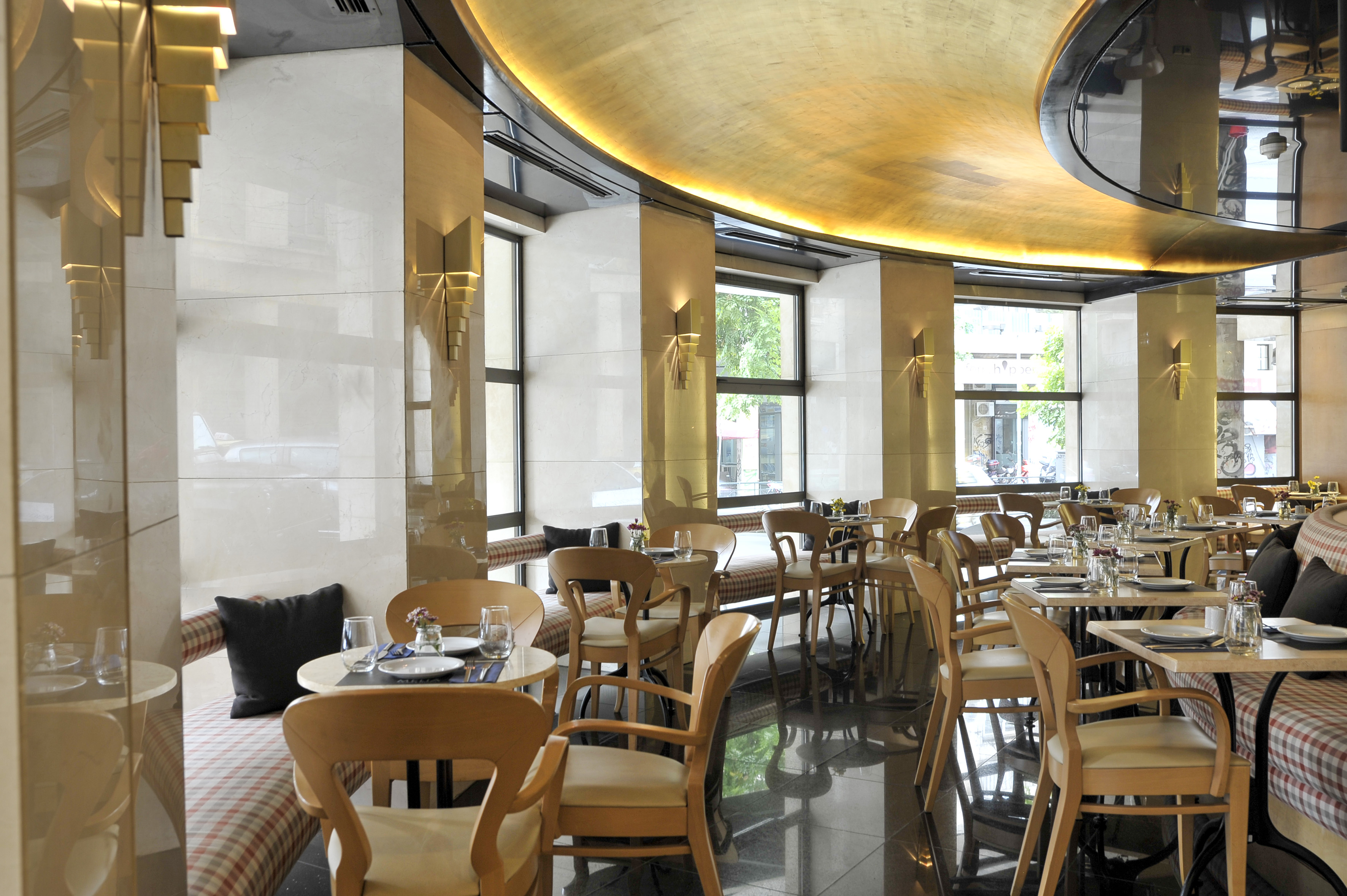 a restaurant with tables and chairs