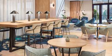 a room with tables and chairs