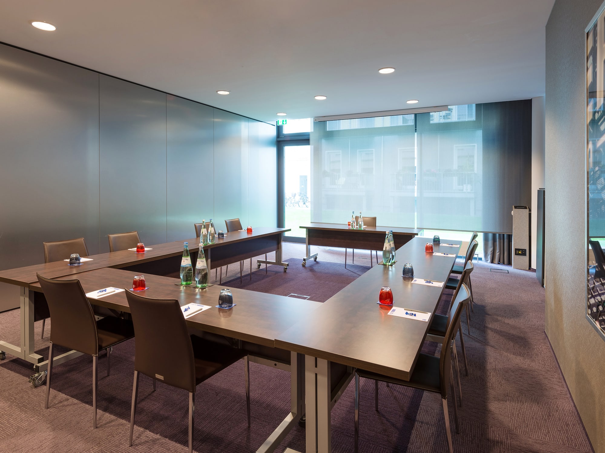 a room with tables and chairs