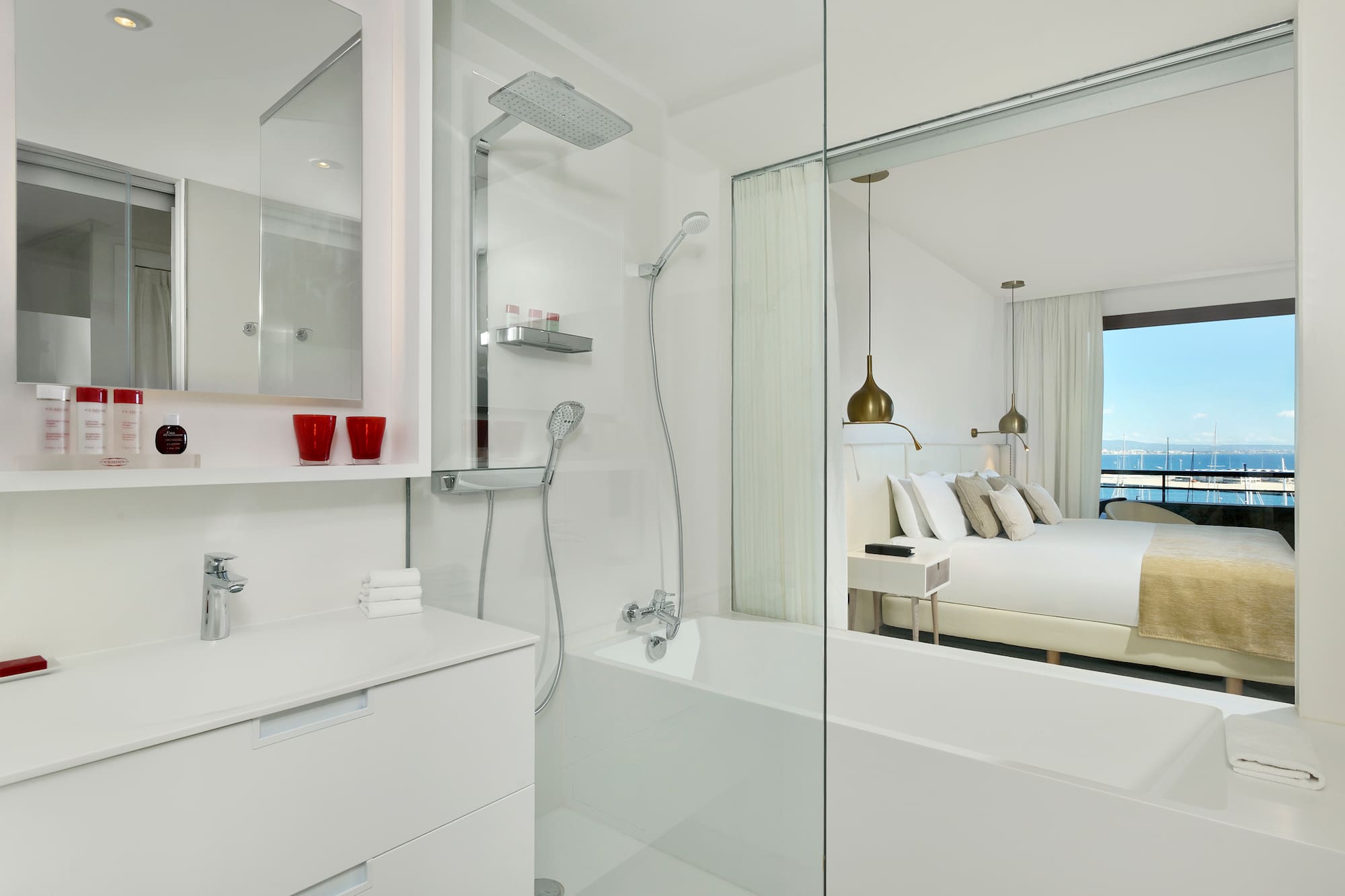 a bathroom with a bathtub and shower