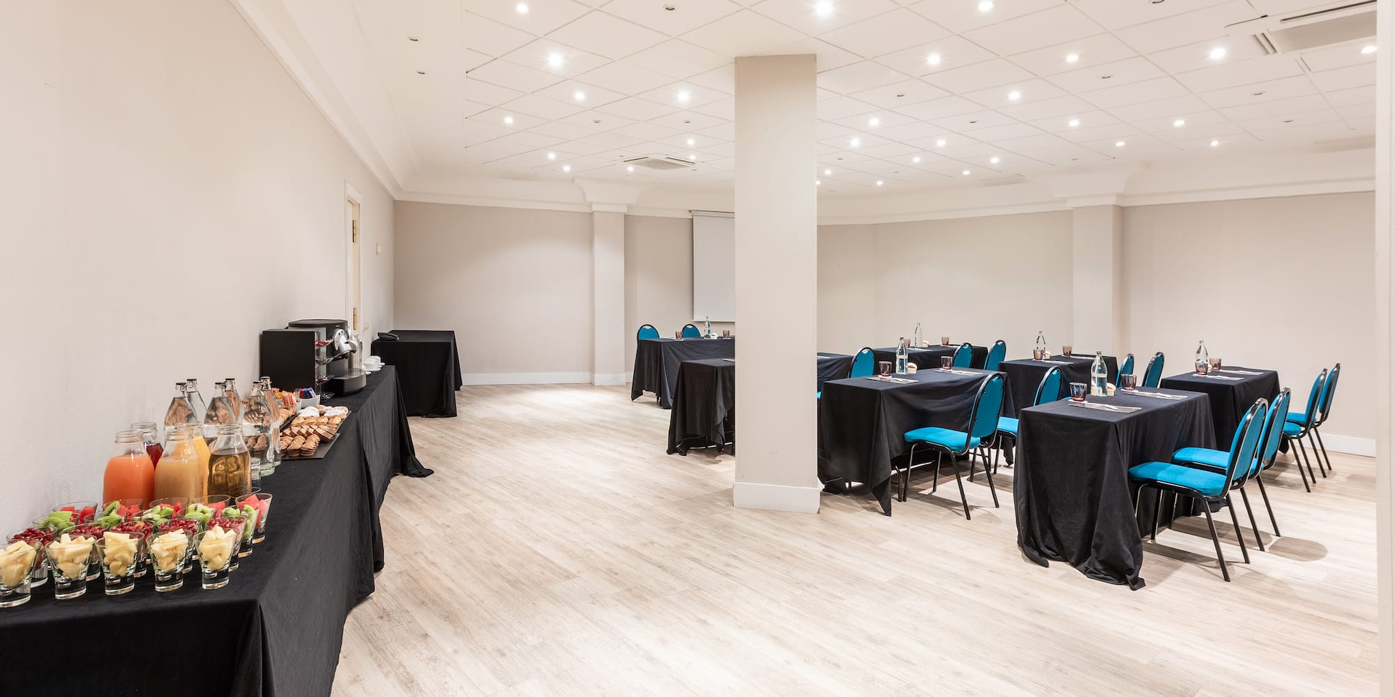 a room with tables and chairs
