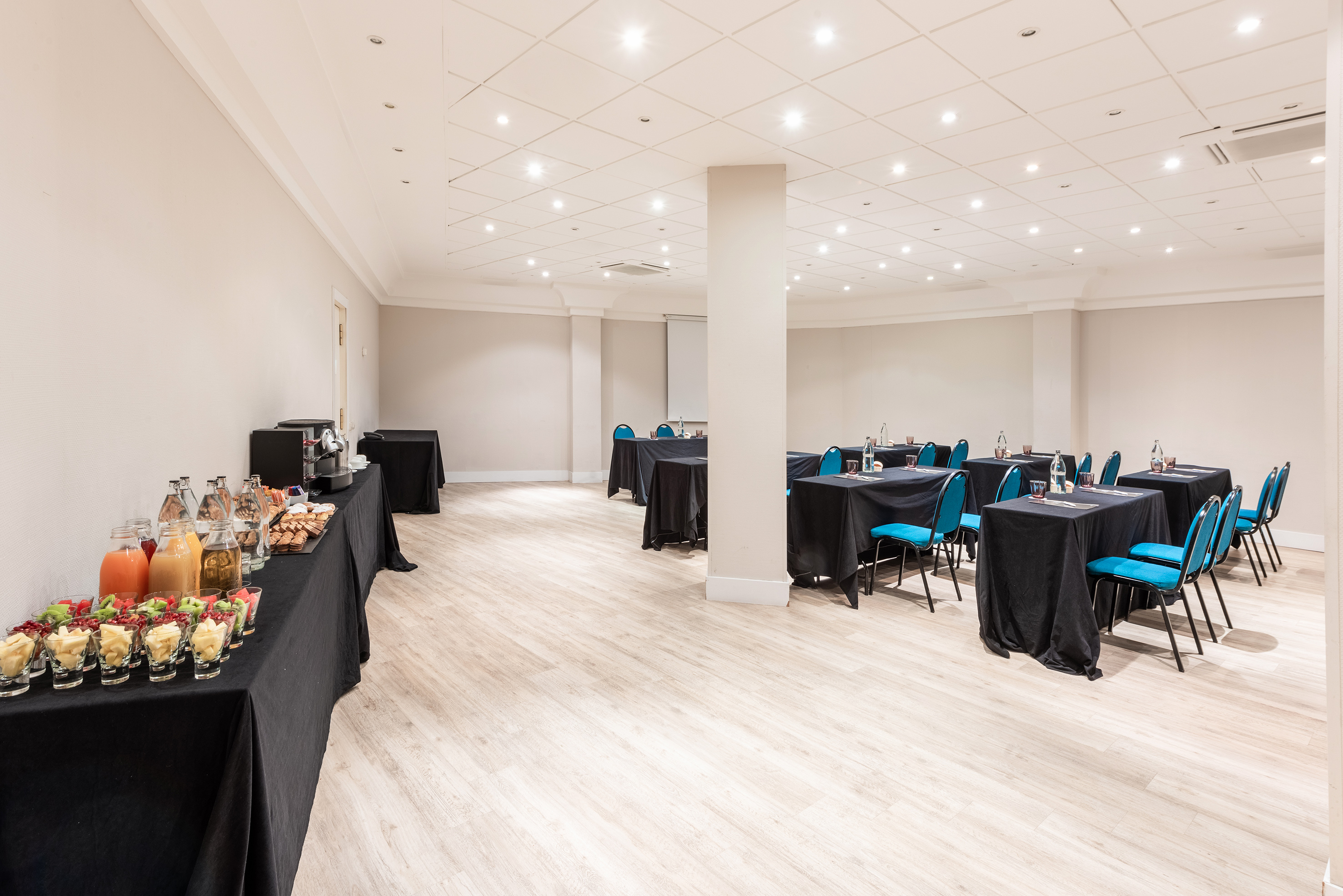 a room with tables and chairs