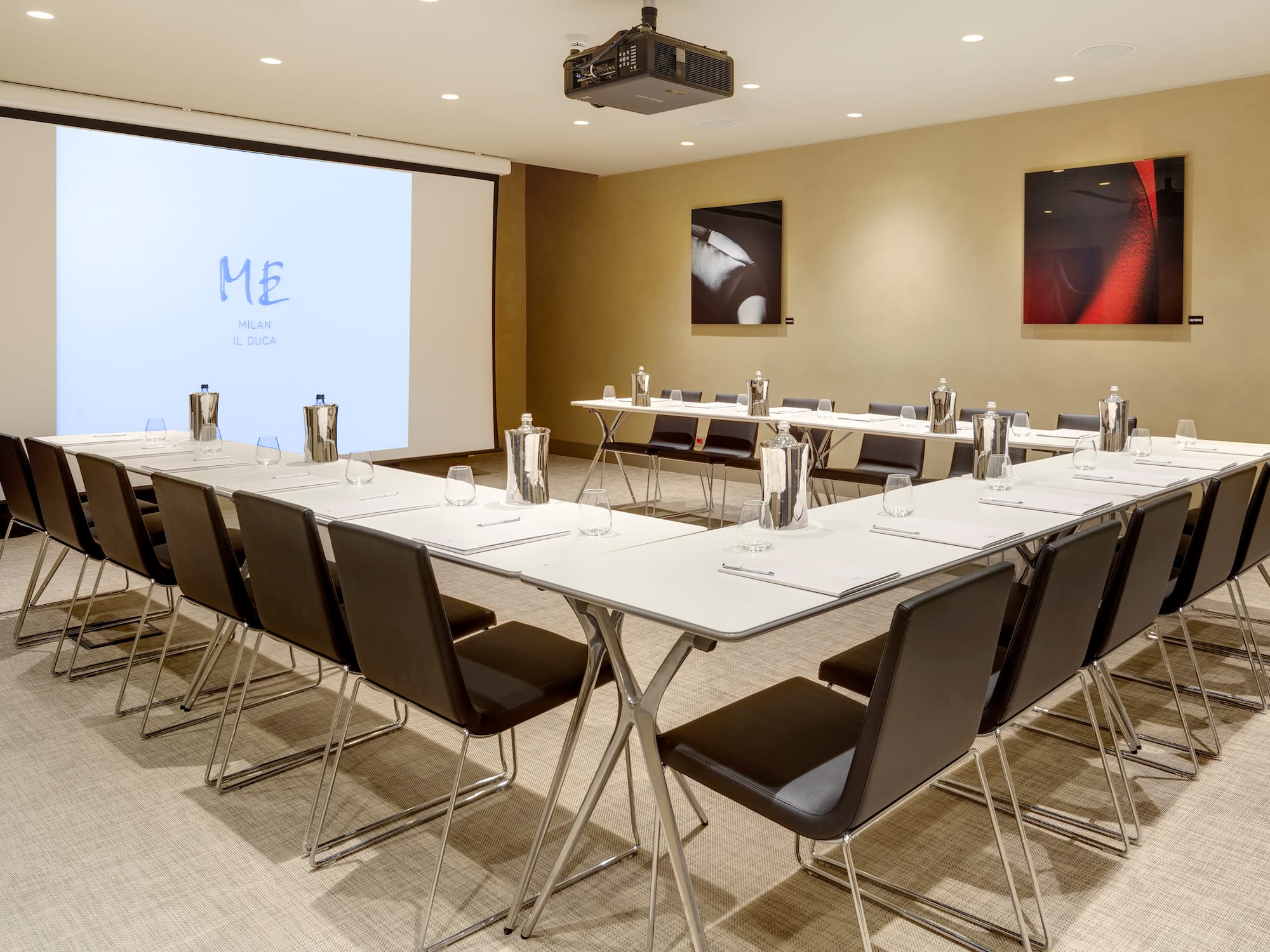 a room with a large projector screen