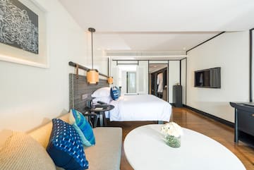 a room with a bed and a couch