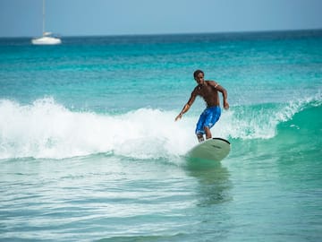 a man surfing on a wave