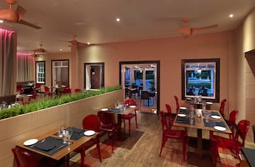 a room with tables and chairs