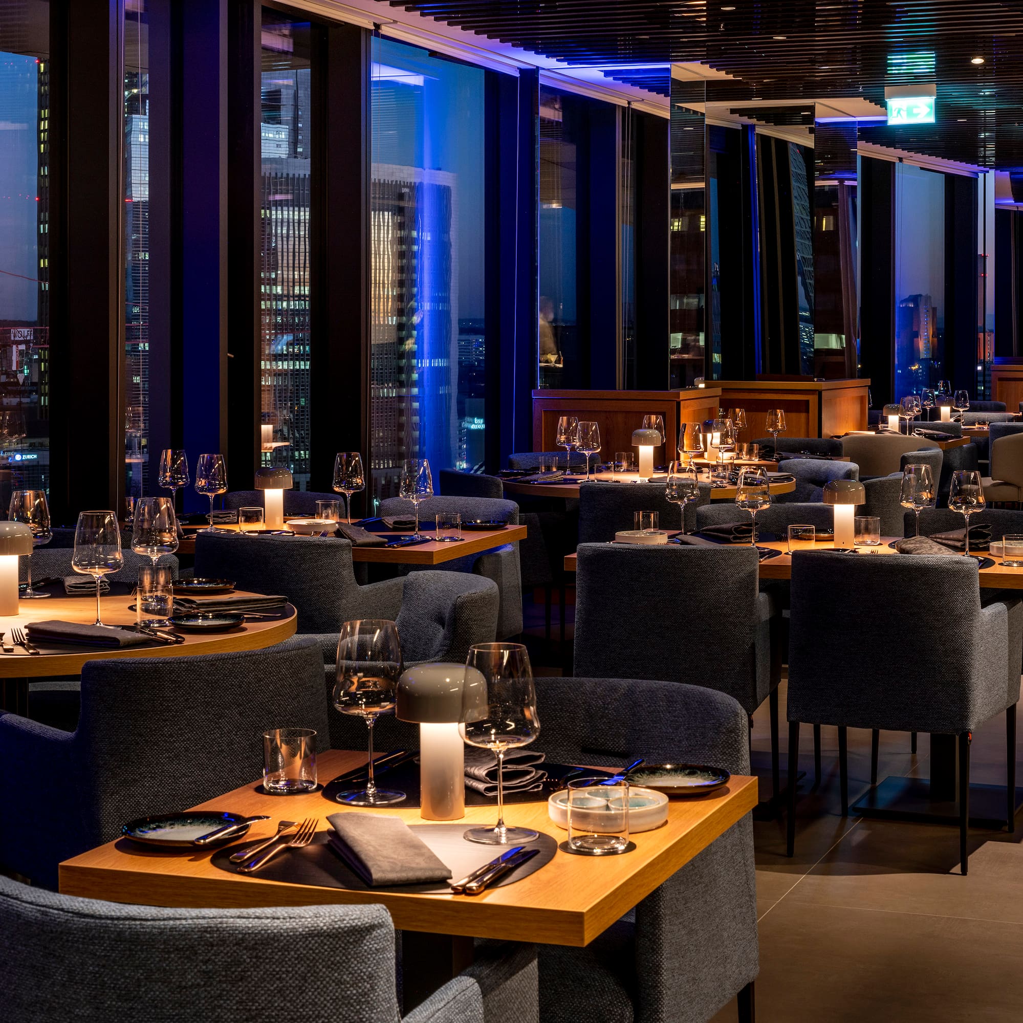 a restaurant with tables and chairs