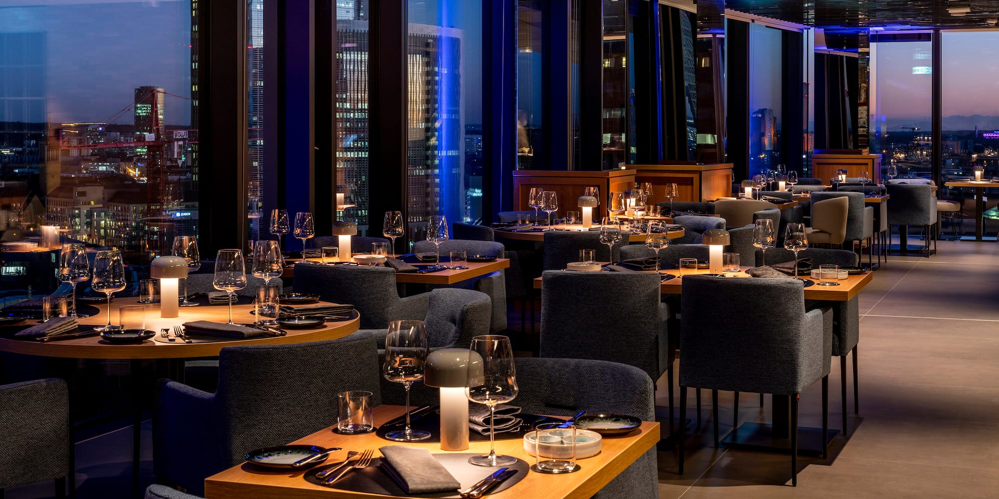 a restaurant with tables and chairs