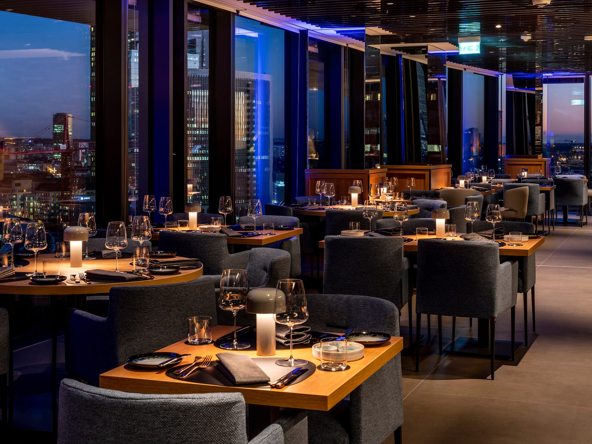 a restaurant with tables and chairs