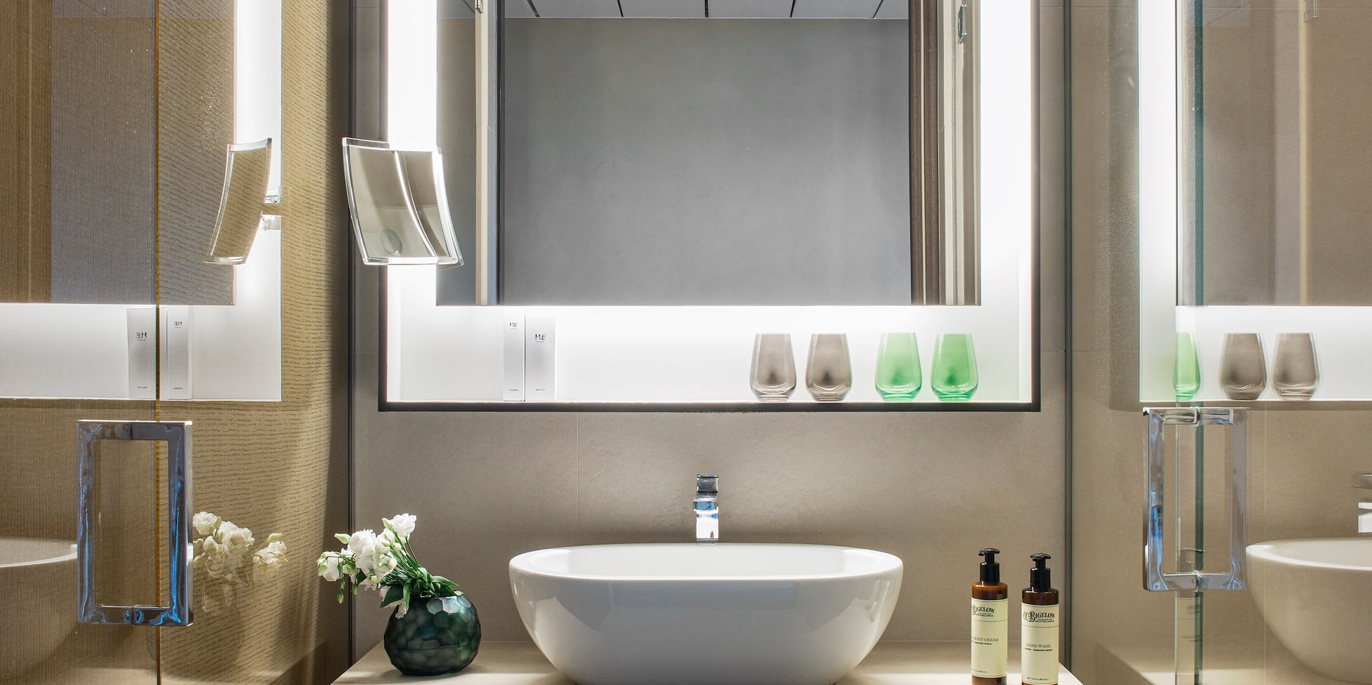 a bathroom with a mirror and sink