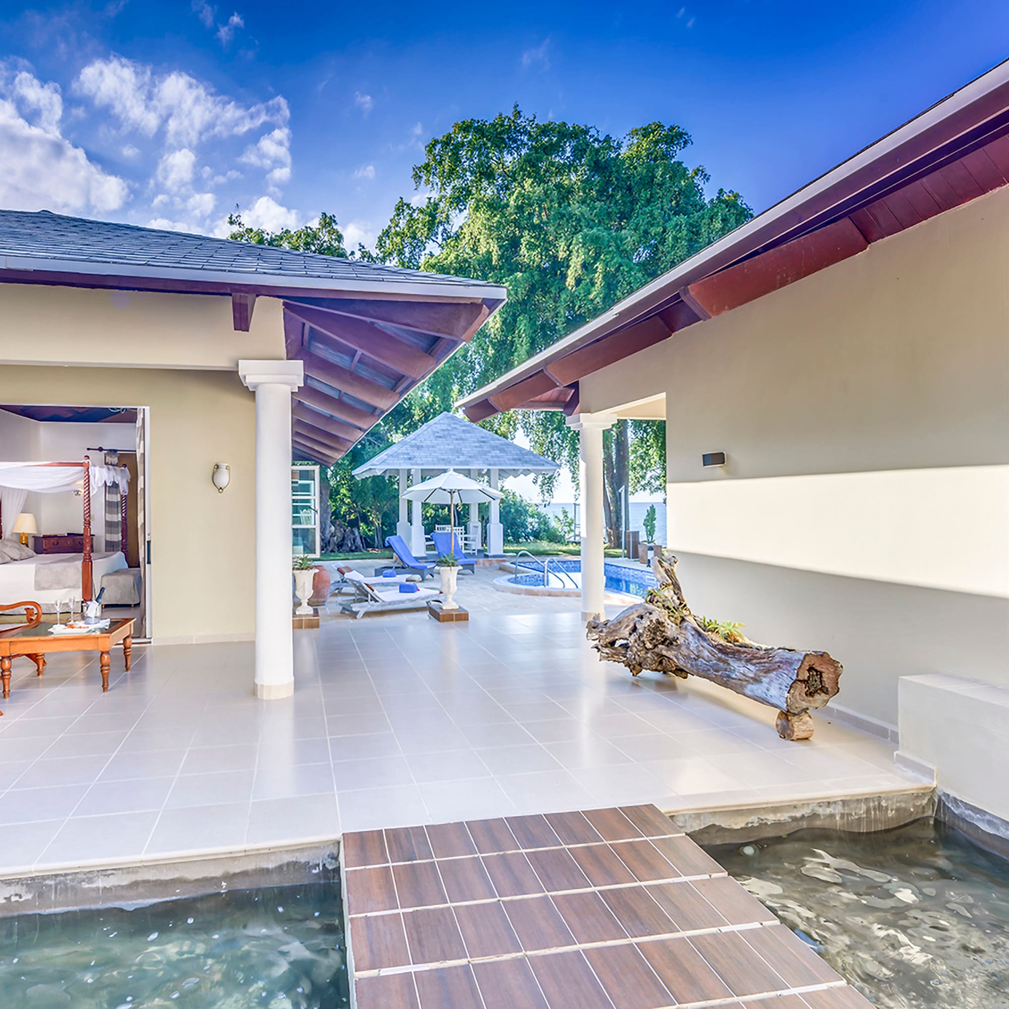 a house with a pool and a bed