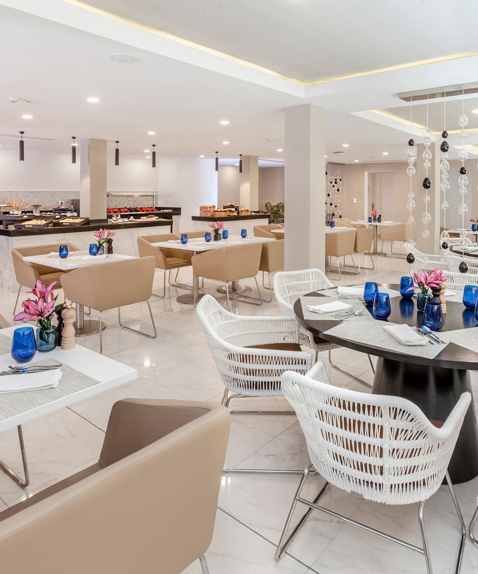 a restaurant with tables and chairs