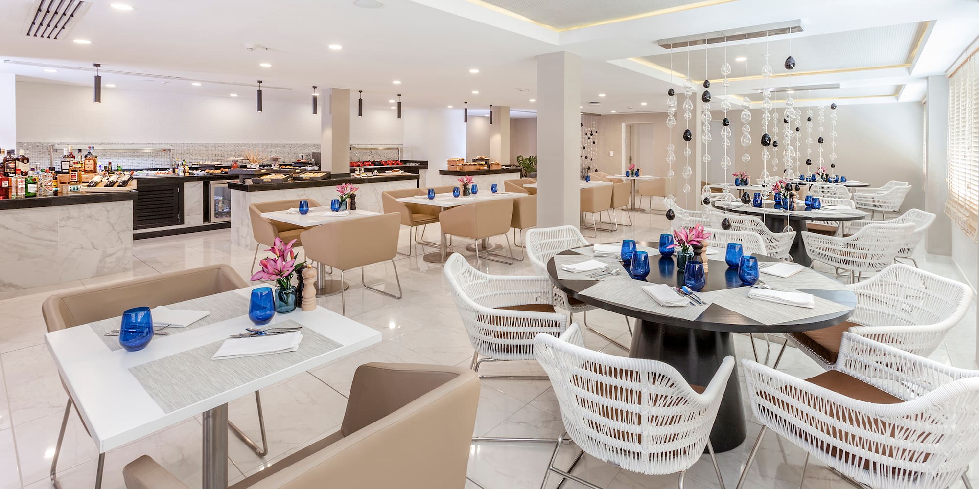 a restaurant with tables and chairs